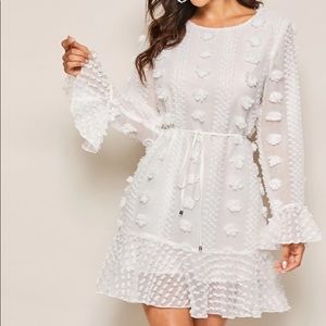 White ruffled sleeve belted dress